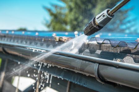 How Roof Washing Prevents Costly Repairs